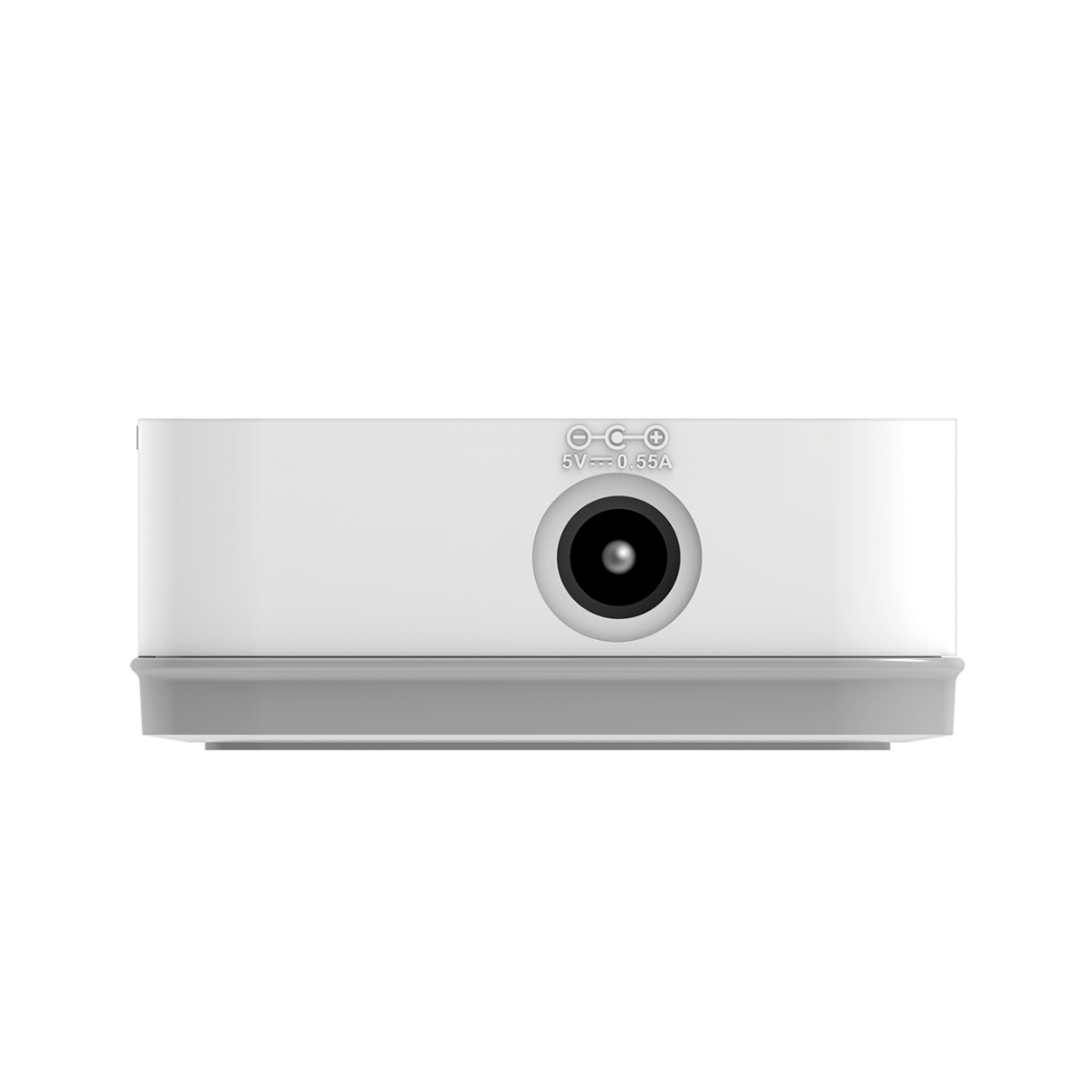 White electronic device with a camera lens on a white background