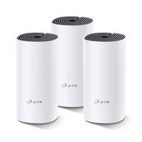 Three TP-Link wireless routers on a white background