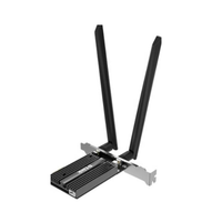Black wireless network adapter with antennas on a white background