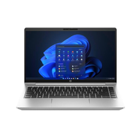 Laptop with a blue abstract design on the screen against a white background