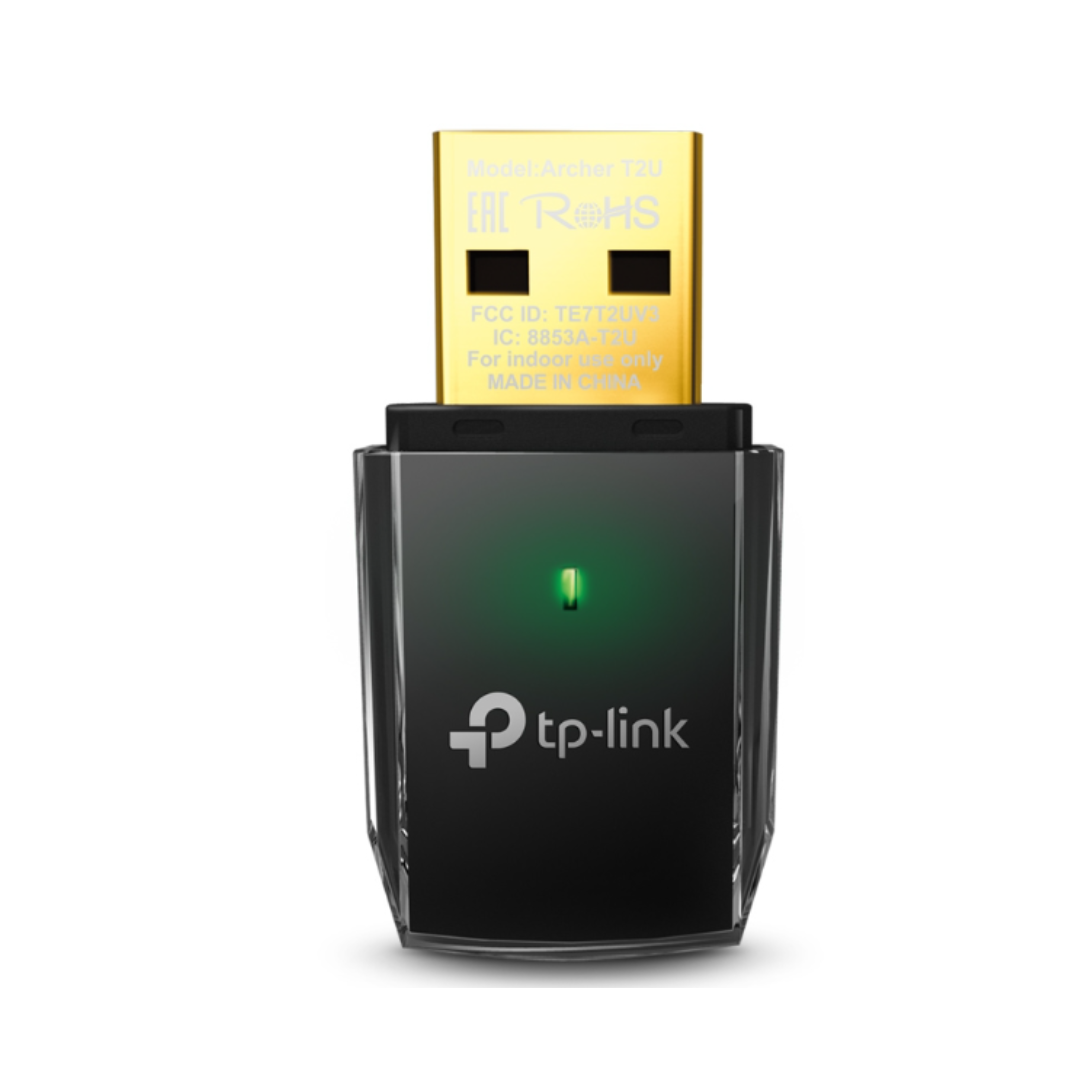 TP-Link USB adapter with a green light on a white background