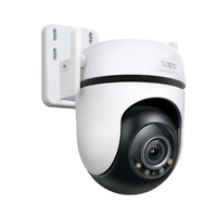White security camera with black lens on a white background