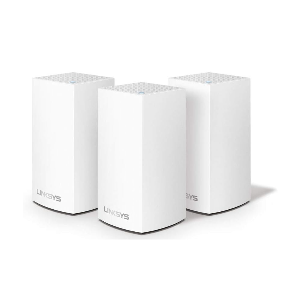 Three Linksys routers on a white background