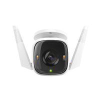 White security camera with antennas on a white background