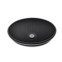 Black round speaker on a white background