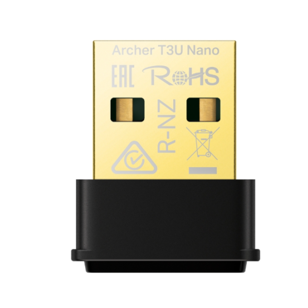 USB adapter with gold top and black base on a white background