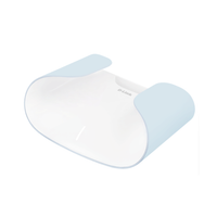 Baby bib and mat set with blue and white design on a white background