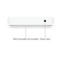 White wall-mounted device with power input labeled on a white background