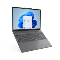 Laptop with a blue flower on the screen on a white background
