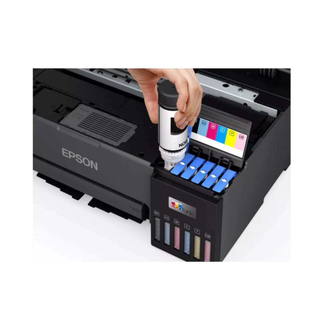 Epson printer with ink cartridge being inserted on a white background