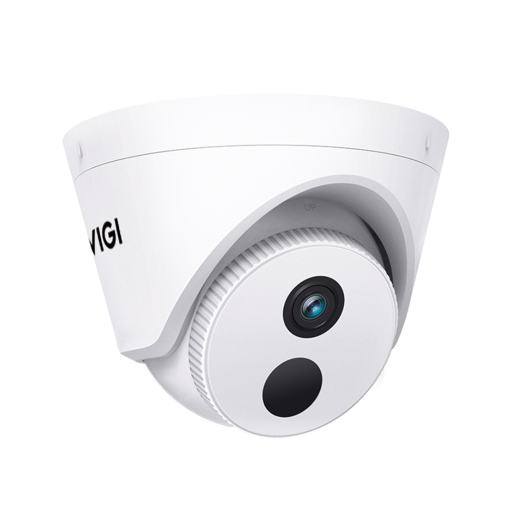 White security camera with a black lens on a white background