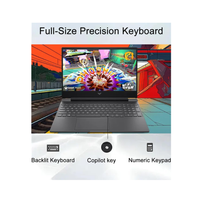 Laptop with full-size precision keyboard features highlighted on a colorful background