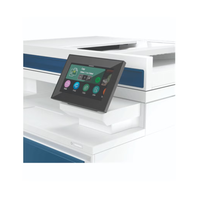 Control panel with touchscreen interface on a white and blue machine