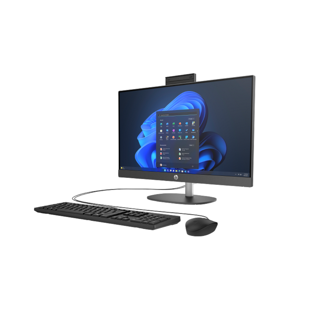 All-in-one computer with monitor, keyboard, and mouse on a white background