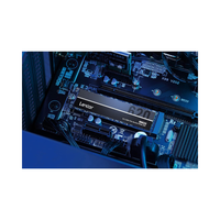 Close-up of a computer motherboard with Lexar RAM installed on a white background