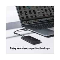 External hard drive connected to a laptop with text 'Enjoy seamless, super-fast backups'.