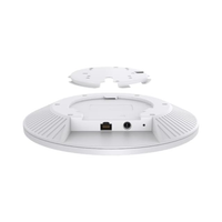 White electronic device with a circular design on a white background