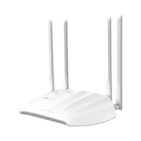 White router with four antennas on a white background