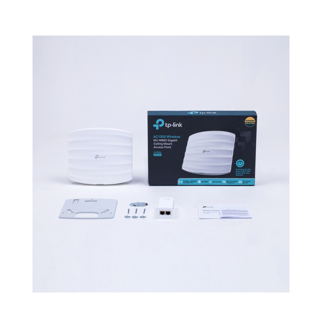 TP-Link access point with packaging and accessories on a white background