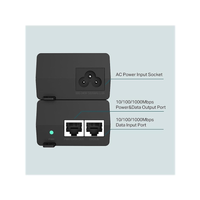 Network adapter with labeled ports on a light gray background