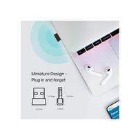 Small device with a smartphone on a light gray background, featuring text about miniature design and plug-and-play functionality.