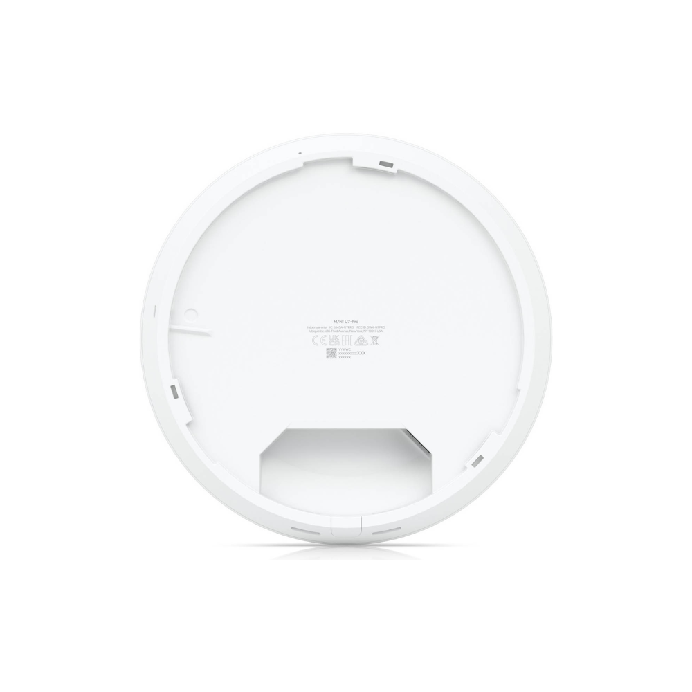 Round white device with a transparent cover on a white background
