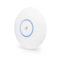 White round device with a blue light on a white background